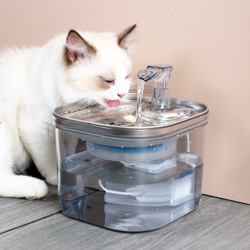 White cat drinking from the Smart 2L Pet Water Fountain
